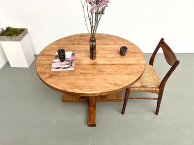 Round pine table "Les Arcs - 1970".