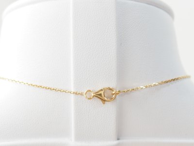 Collier pendentif marguerite en or jaune et grenats