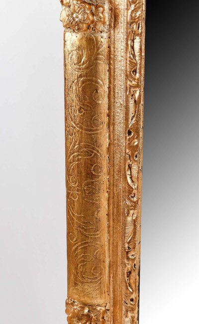 Miroir en bois et stuc sculpté et doré d’époque Régence vers 1720