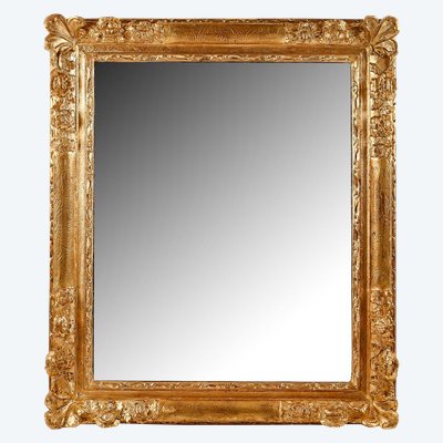 Miroir en bois et stuc sculpté et doré d’époque Régence vers 1720