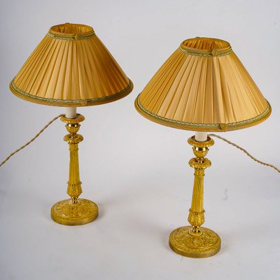 Paire de Flambeaux d’Époque Restauration en Bronze Ciselé et Doré Montés en Lampes vers 1820