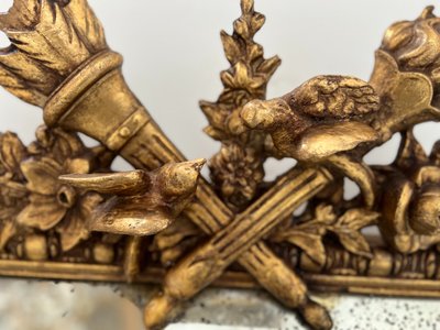 Miroir a pare closes de style Louis XVI en bois et stuc doré XIX siècle