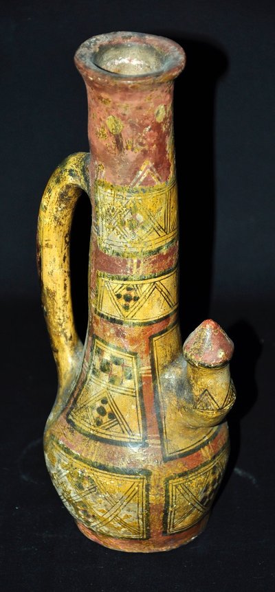 Kabyle pottery titled Late 19th-century vase with polychrome geometric decoration