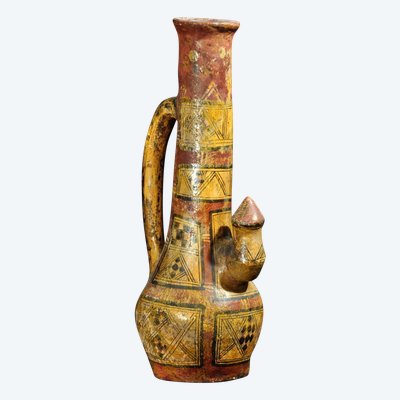 Kabyle pottery titled Late 19th-century vase with polychrome geometric decoration