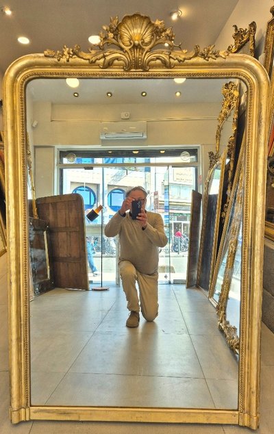 Louis Philippe gilded mirror with Louis XV rocaille cartouche, circa 1870/1880, 100*151cm