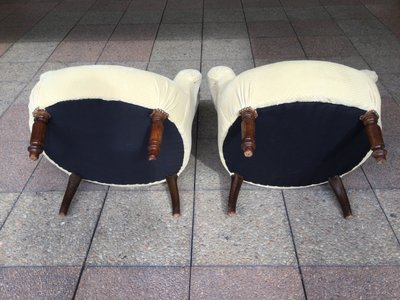 A pair of very comfortable bergères or chauffeuses.