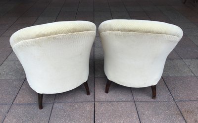 A pair of very comfortable bergères or chauffeuses.