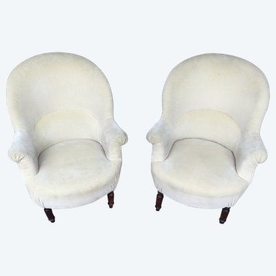A pair of very comfortable bergères or chauffeuses.