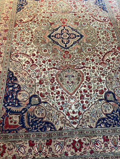 Large hand-knotted wool Persian Isfahan rug large central medallion richly decorated with flowers