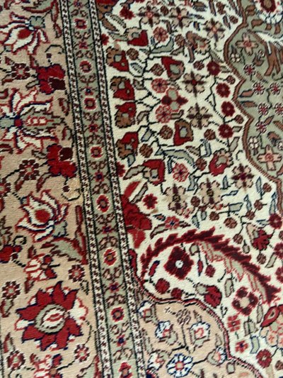 Large hand-knotted wool Persian Isfahan rug large central medallion richly decorated with flowers