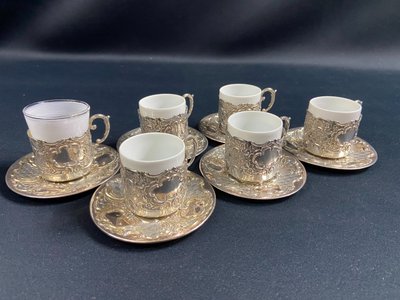 Suite di 6 coppe e 6 piattini in argento massiccio in stile Regency