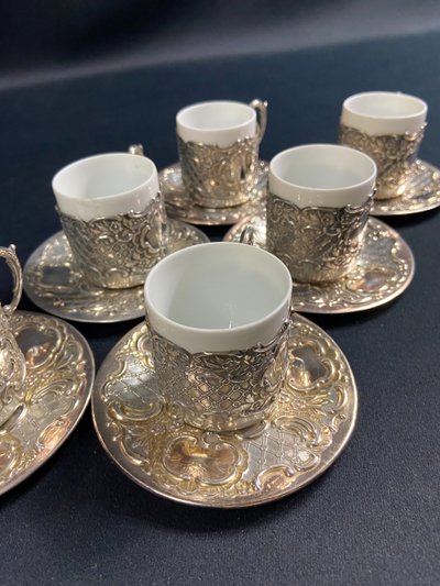 Suite di 6 coppe e 6 piattini in argento massiccio in stile Regency