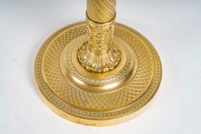 Paire de flambeaux d’époque Restauration en bronze ciselé et doré montés en lampes vers 1830