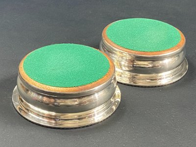 Pair of Louis XV style silver-plated metal coasters