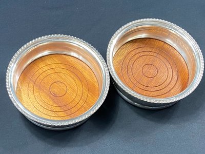 Pair of Louis XV style silver-plated metal coasters
