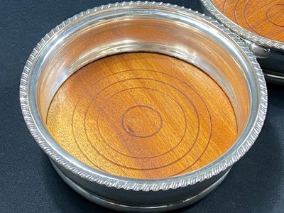 Pair of Louis XV style silver-plated metal coasters