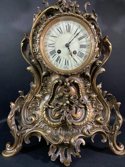 Large Louis XV style bronze cartel clock