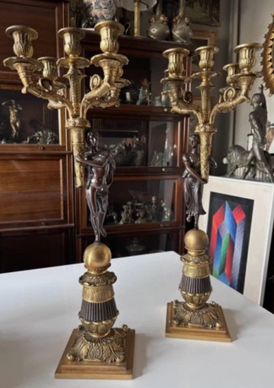 Pair of five-light bronze candelabra with double patina Empire or Restoration style