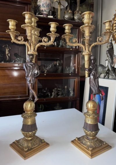 Pair of five-light bronze candelabra with double patina Empire or Restoration style