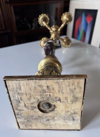 Pair of five-light bronze candelabra with double patina Empire or Restoration style