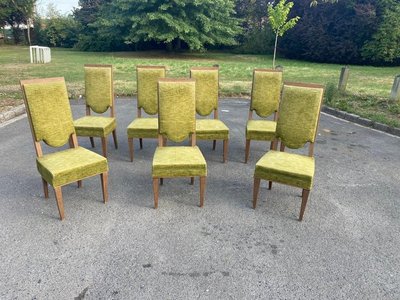 suite de 7 chaises art deco en chêne dans le style de Maurice Jallot, André Arbus, circa 1940