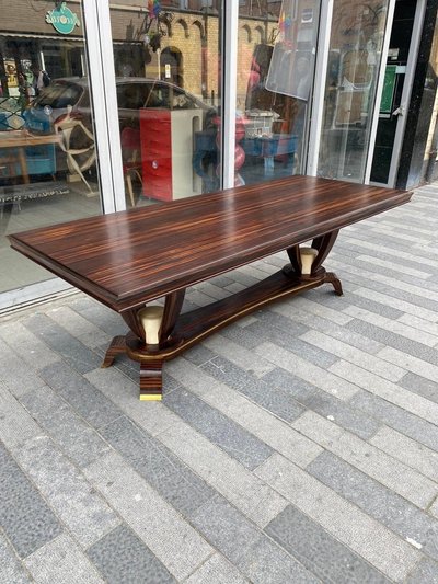 Baptistin Spade (1891-1969) elegant large Art Deco table in Macassar, parchment and bronze.