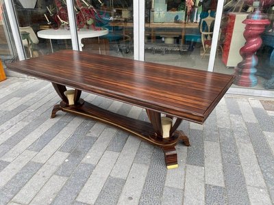 Baptistin Spade (1891-1969) elegant large Art Deco table in Macassar, parchment and bronze.