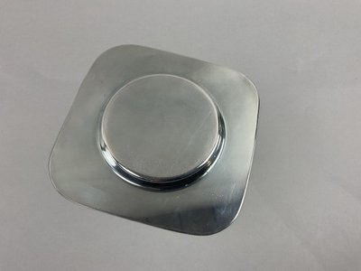 Pair of art deco silver-plated metal coasters
