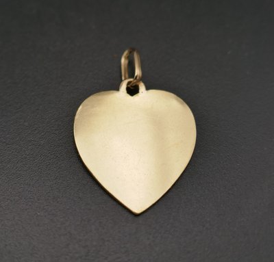 Important Augis Heart of Love Diamond and Ruby Medal, 18-carat gold.