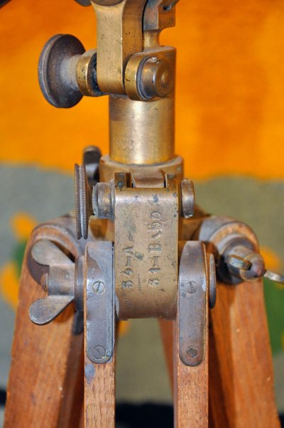 Blackened brass spyglass on wooden tripod 19th century period