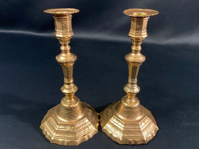 Pair of brass candlesticks with chased decoration 18th Regency period