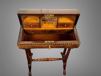 ORIGINAL MARQUETRY WORK IN THE CHARLES X PERIOD OPENING WITH A CYLINDER