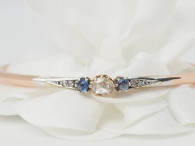 Art Nouveau bangle bracelet in two-tone gold, sapphires and diamonds