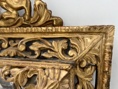 Miroir a pare closes de style Louis XIV en bois et stuc doré XIX siècle