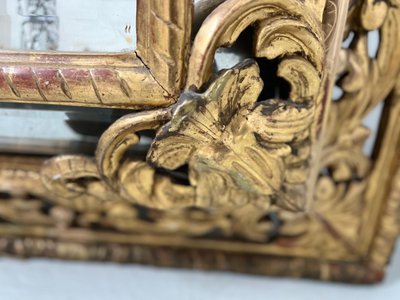 Miroir a pare closes de style Louis XIV en bois et stuc doré XIX siècle