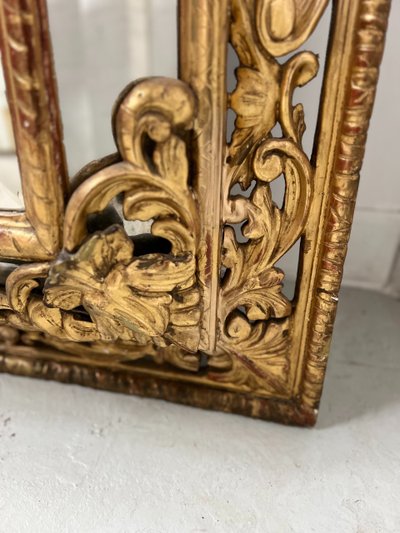 Miroir a pare closes de style Louis XIV en bois et stuc doré XIX siècle