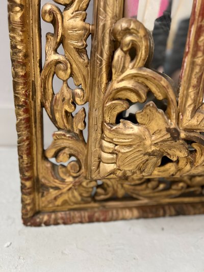 Miroir a pare closes de style Louis XIV en bois et stuc doré XIX siècle