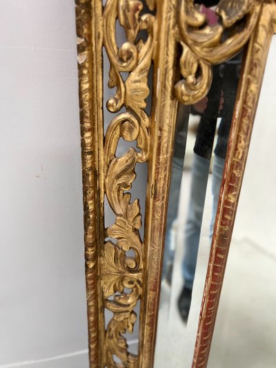 Miroir a pare closes de style Louis XIV en bois et stuc doré XIX siècle