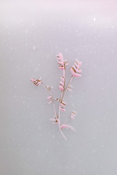 A pair of white and pink opaline vases, early 20th century