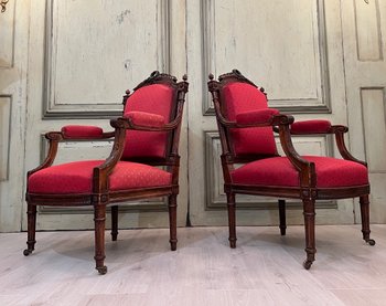 Coppia di poltrone in stile Luigi XVI modellate e intagliate 19° secolo