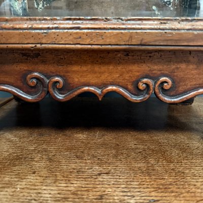 Small Louis XV mahogany display cabinet with winkle feet