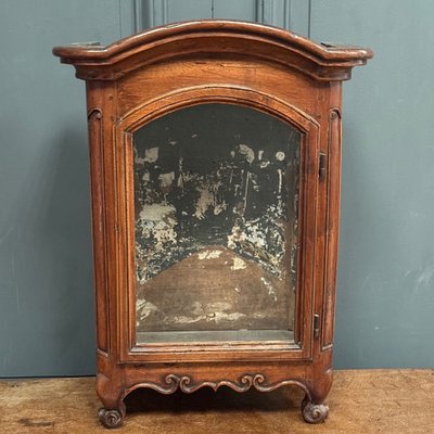 Small Louis XV mahogany display cabinet with winkle feet