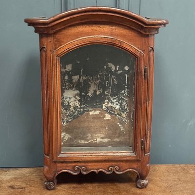 Small Louis XV mahogany display cabinet with winkle feet