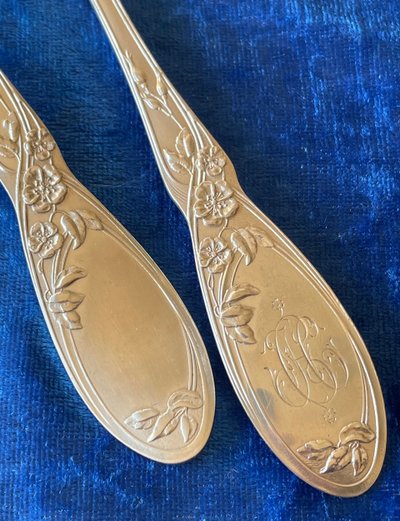 2 art nouveau place settings.