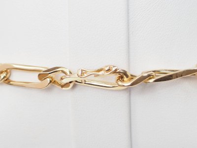 Collana a catena figurata alternata in oro giallo