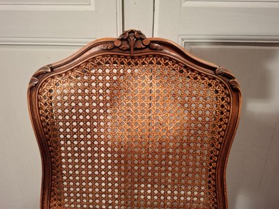 Suite de six chaises cannées en hêtre de style Louis XV.