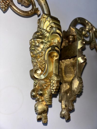 Pair of Louis XIV style sconces in chased ormolu Decorated with mascaron ( bacchus )