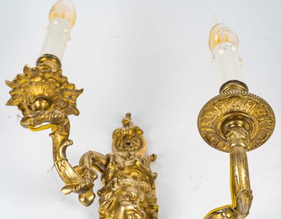 Paar Wandleuchten, genannt Aux Zéphyrs, aus ziselierter und vergoldeter Bronze XIX.