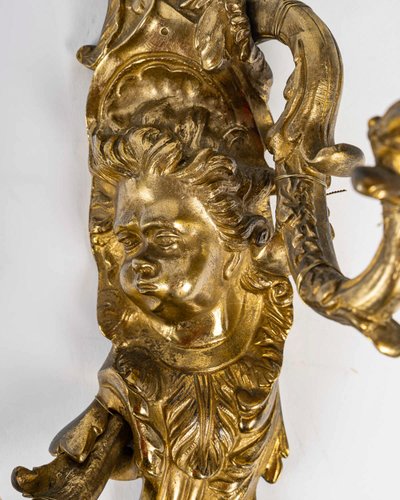 Paar Wandleuchten, genannt Aux Zéphyrs, aus ziselierter und vergoldeter Bronze XIX.
