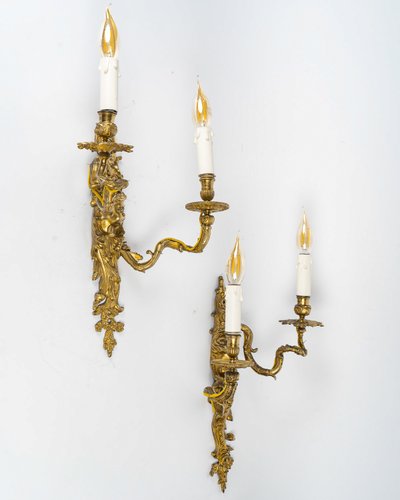 Paar Wandleuchten, genannt Aux Zéphyrs, aus ziselierter und vergoldeter Bronze XIX.